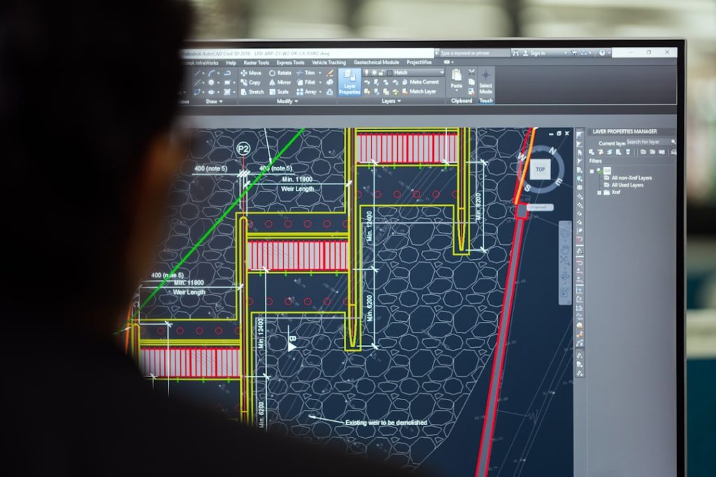 Mastering the First Impression: Your intriguing post title goes here Female civil engineer designs weirs on computer